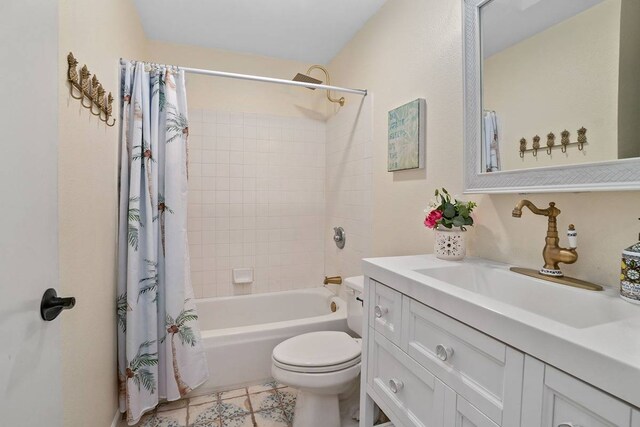 full bathroom featuring shower / bath combination with curtain, toilet, vanity, and tile flooring