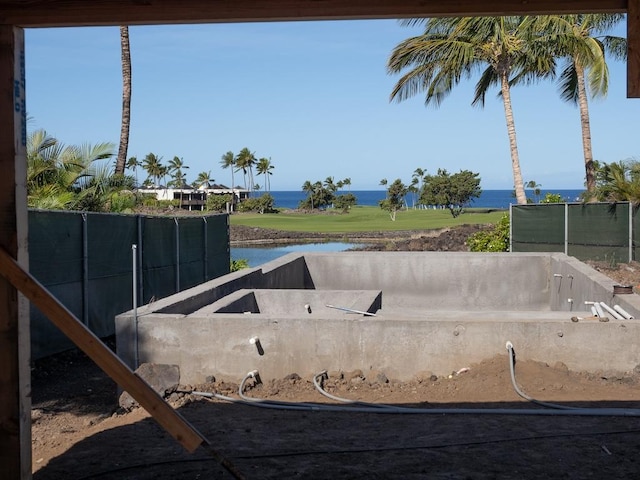 view of patio with a water view