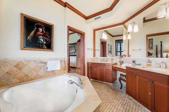 bathroom with tiled tub, oversized vanity, ornamental molding, and tile flooring