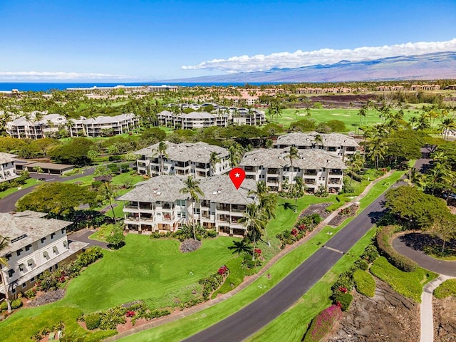 birds eye view of property featuring a mountain view