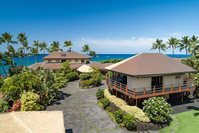 exterior space with a water view