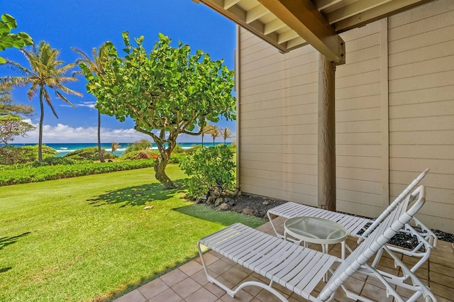 view of patio featuring a water view