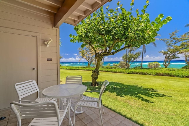 view of patio featuring a water view