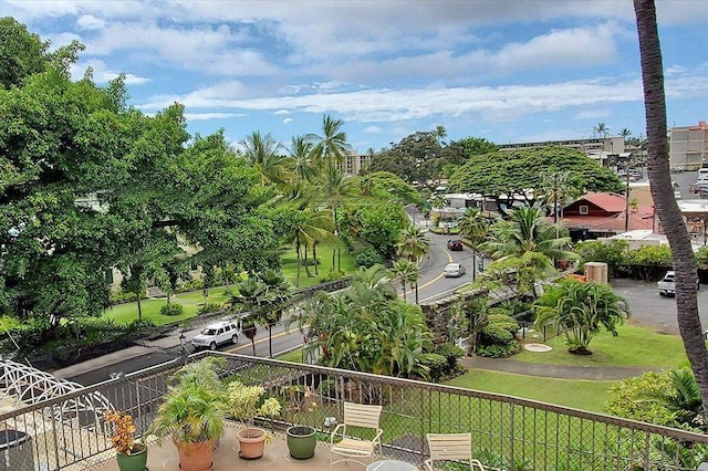 view of home's community with a yard