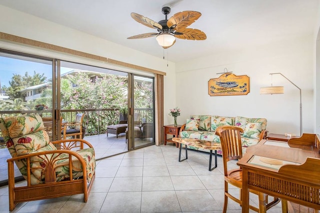 tiled living room featuring ceiling fan