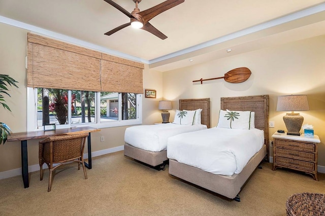 bedroom featuring ceiling fan, light carpet, and ornamental molding