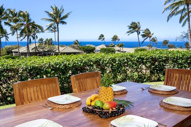 dining area featuring a water view