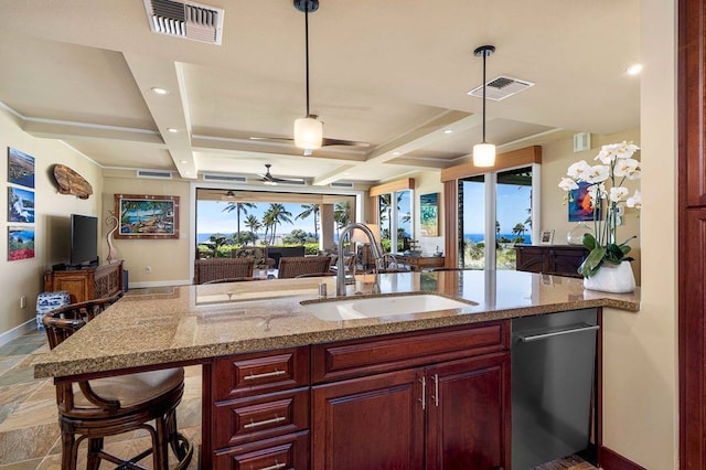 kitchen featuring ceiling fan, sink, hanging light fixtures, and coffered ceiling