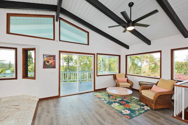 unfurnished room featuring ceiling fan, beam ceiling, high vaulted ceiling, and wood-type flooring