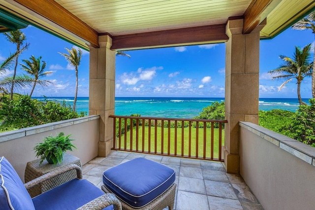 balcony featuring a water view