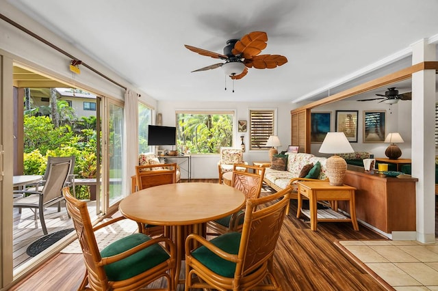 dining space featuring light hardwood / wood-style floors and ceiling fan