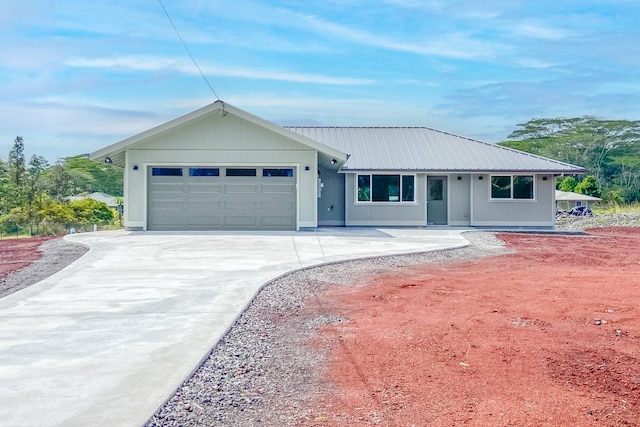 ranch-style house featuring a garage