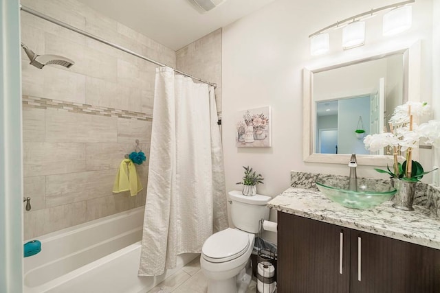 full bathroom featuring toilet, vanity, shower / tub combo with curtain, and tile flooring