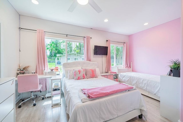 bedroom featuring ceiling fan and light wood-type flooring