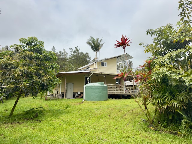 view of yard with a deck