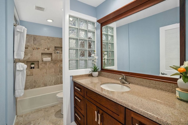 bathroom with toilet, tile flooring, and oversized vanity