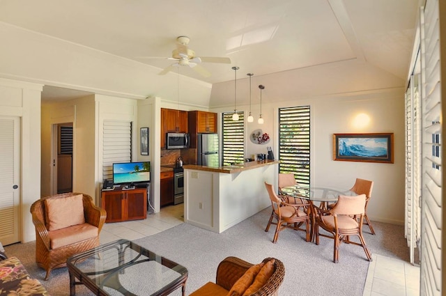 carpeted living room with ceiling fan