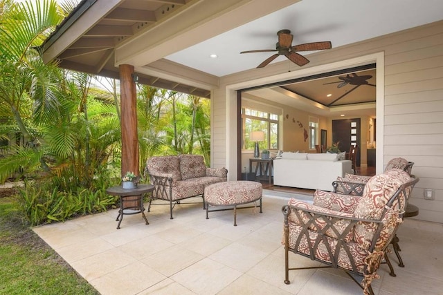 view of patio / terrace featuring an outdoor living space and ceiling fan