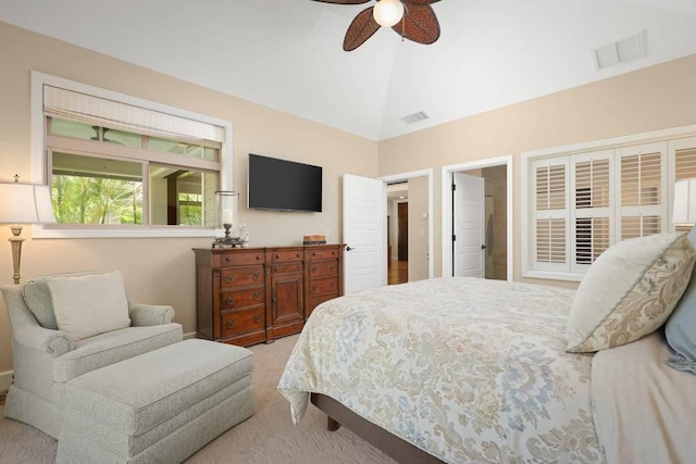 bedroom with lofted ceiling, carpet, and ceiling fan