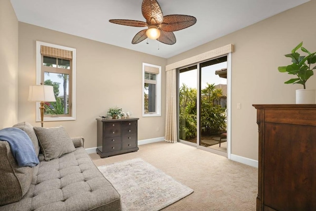 interior space with ceiling fan