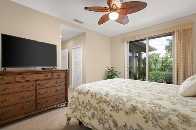 carpeted bedroom with access to exterior and ceiling fan