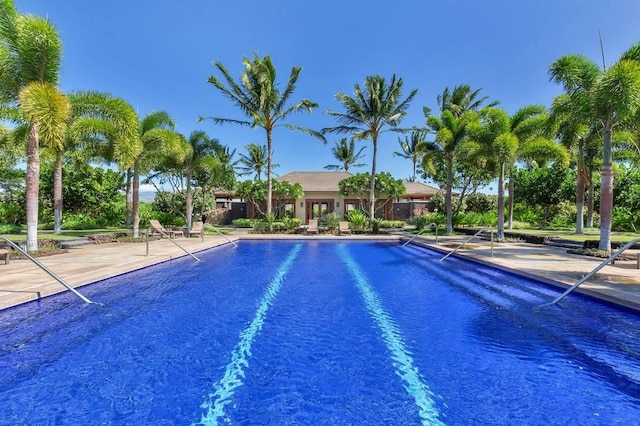 view of swimming pool with a patio area