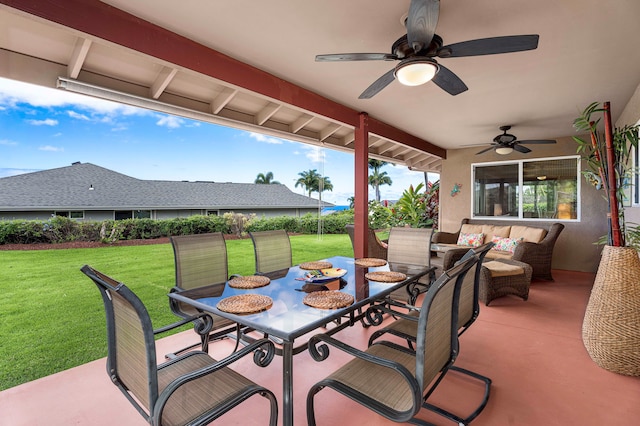 view of patio featuring ceiling fan