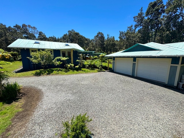 view of side of property featuring a garage