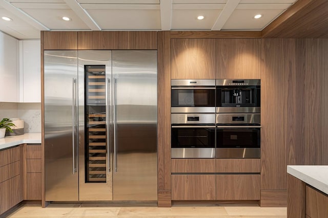 kitchen featuring light hardwood / wood-style floors and stainless steel appliances