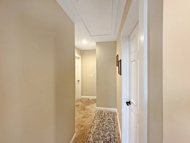 hallway with light tile flooring