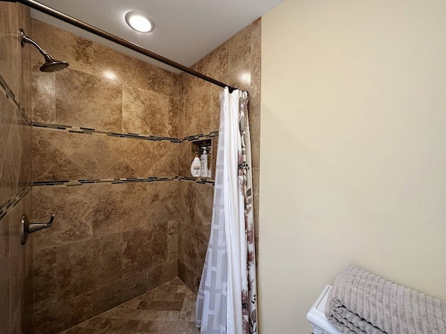 bathroom with a shower with curtain