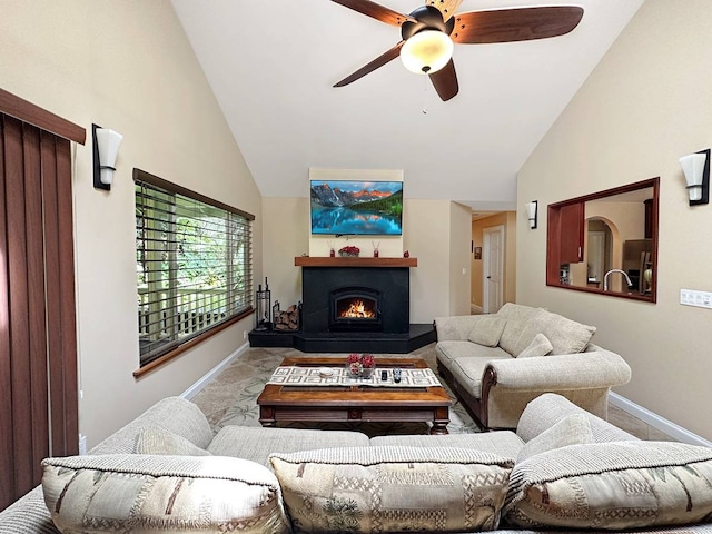 living room with high vaulted ceiling and ceiling fan