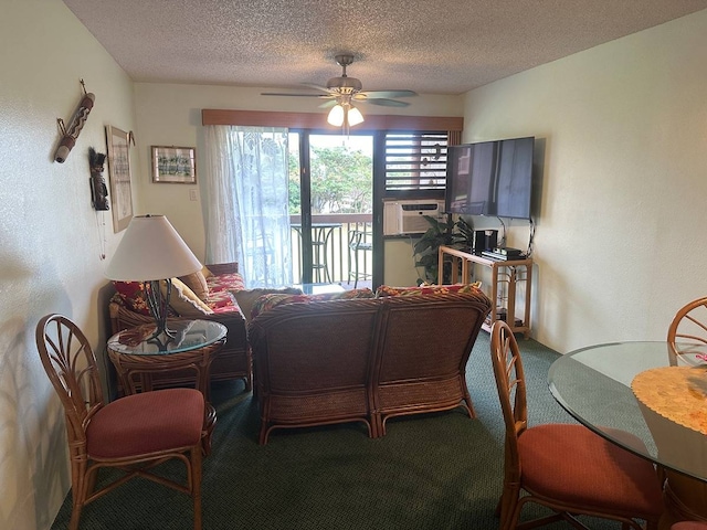 carpeted living room with a textured ceiling and ceiling fan