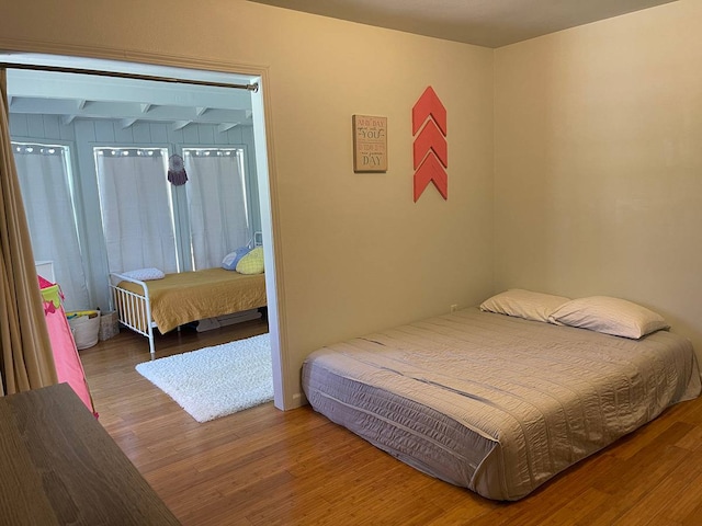 bedroom featuring hardwood / wood-style flooring