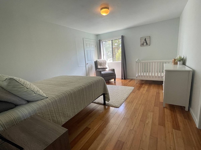 bedroom featuring light wood-type flooring