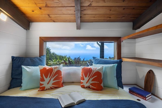 interior space featuring beamed ceiling and wooden ceiling