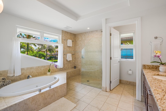 bathroom featuring plenty of natural light, vanity, independent shower and bath, and tile patterned flooring