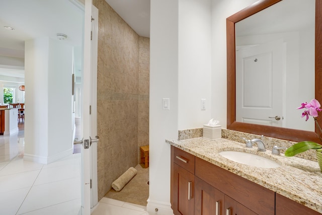 bathroom featuring tile patterned floors and vanity