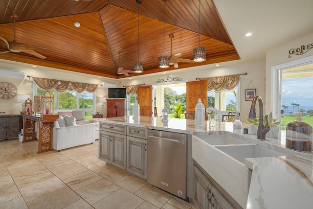 kitchen with stainless steel dishwasher, ceiling fan, a raised ceiling, and wooden ceiling