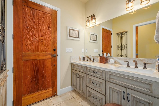 bathroom featuring tile flooring and dual bowl vanity