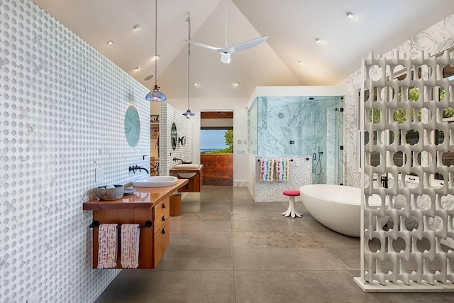 bathroom featuring high vaulted ceiling, vanity, ceiling fan, and independent shower and bath