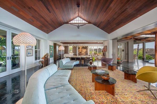 living room featuring french doors, wood ceiling, and plenty of natural light