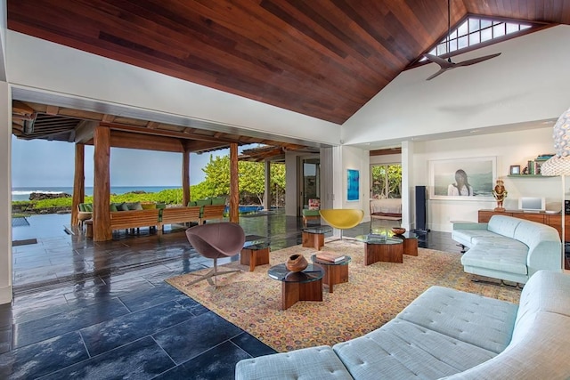 interior space with ceiling fan, a water view, wood ceiling, and high vaulted ceiling