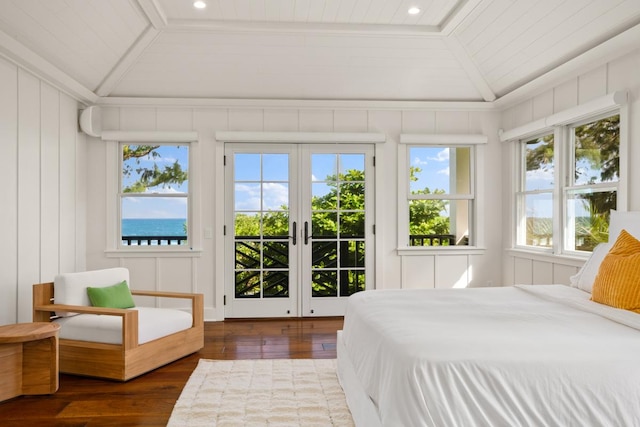 bedroom with dark hardwood / wood-style flooring, access to exterior, french doors, and lofted ceiling