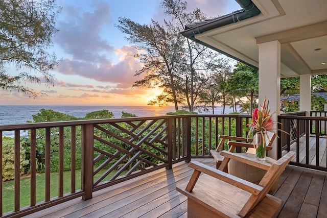 deck at dusk with a water view