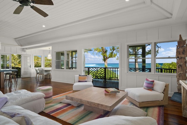 sunroom with a water view, ceiling fan, and wooden ceiling