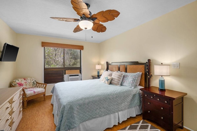 bedroom featuring ceiling fan and light wood-type flooring