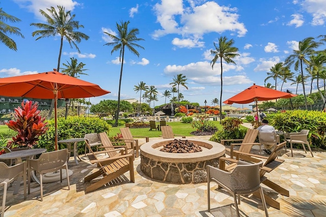 view of patio featuring an outdoor fire pit