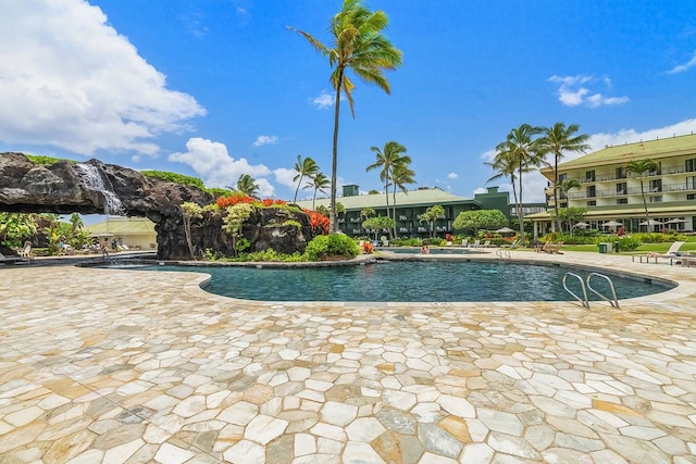 view of swimming pool featuring a patio