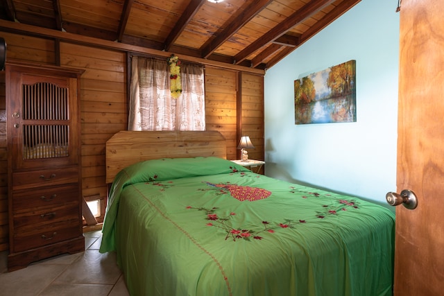 bedroom with wood ceiling, lofted ceiling with beams, and tile floors